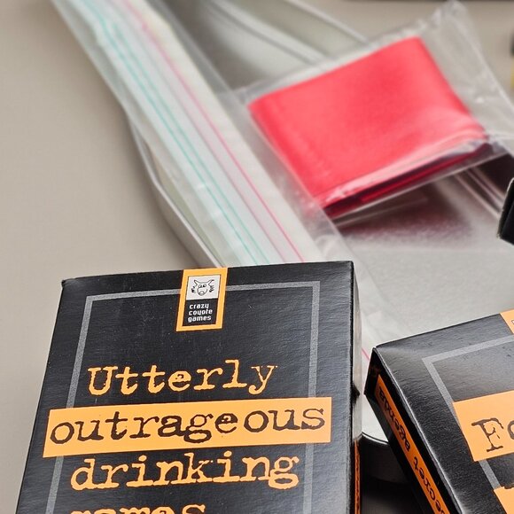 Utterly Outrageous Drinking Games bottle shaped tin box with 25 games dated 2007 - Picture 7 of 14